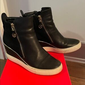 Sleek Black Leather Wedge Sneakers